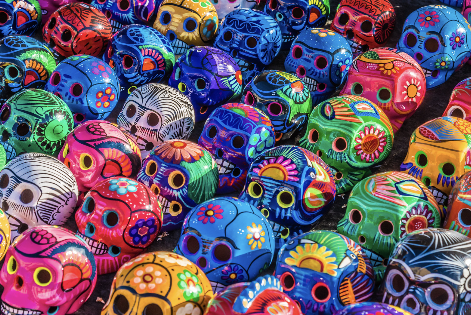 Colorful painted skulls at a festival