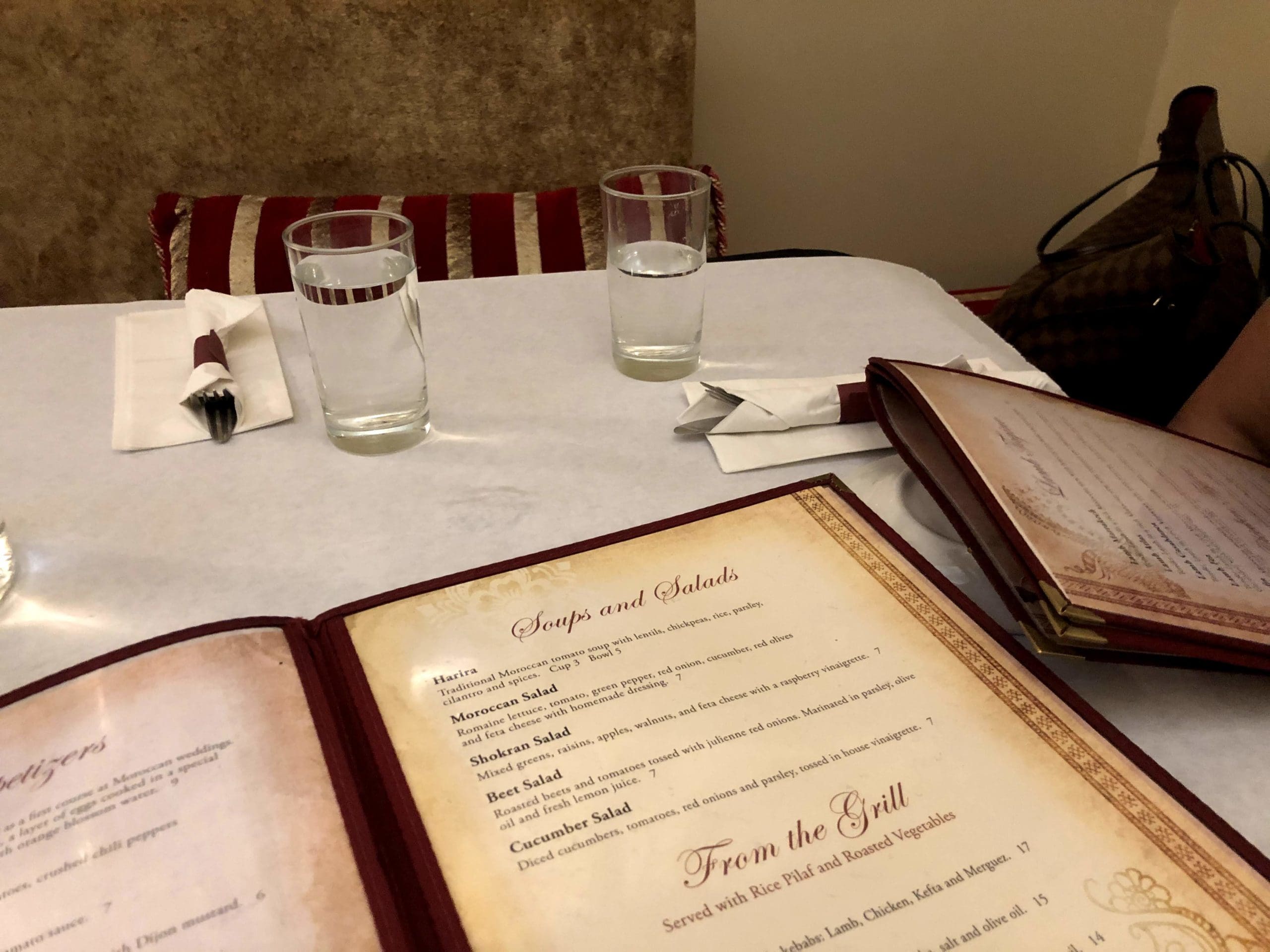 Restaurant with table and menus open